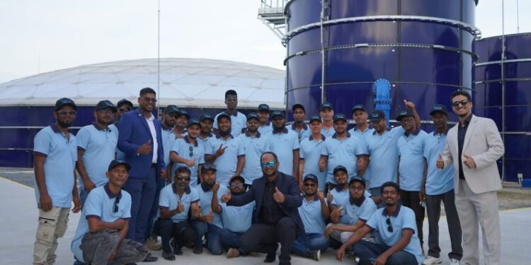 President Irfaan Ali's brother, Aqtar Ali (third from left) with Sigma Team (Opposition Leader Azruddin Mohamed's photo)