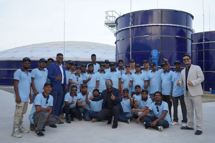 President Irfaan Ali's brother, Aqtar Ali (third from left) with Sigma Team (Opposition Leader Azruddin Mohamed's photo)