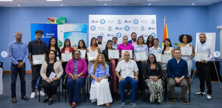 Minister of Health Dr Frank Anthony, along with representatives from Mount Sinai and graduates of the Digital Health Training Institute (DPI photo)