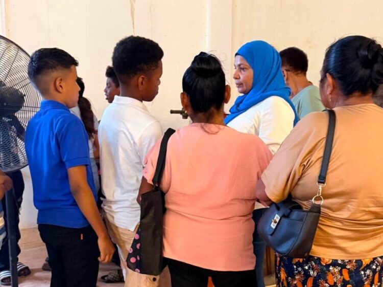 MP Natasha Singh (blue hijab) engaging residents in Region One during her days-long visit last week