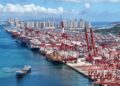 A drone photo taken on Aug. 25, 2026 shows container ships berthed at the Qianwan Container Terminal of Qingdao Port in Qingdao, east China's Shandong Province. (Photo by Zhang Jingang/Xinhua)