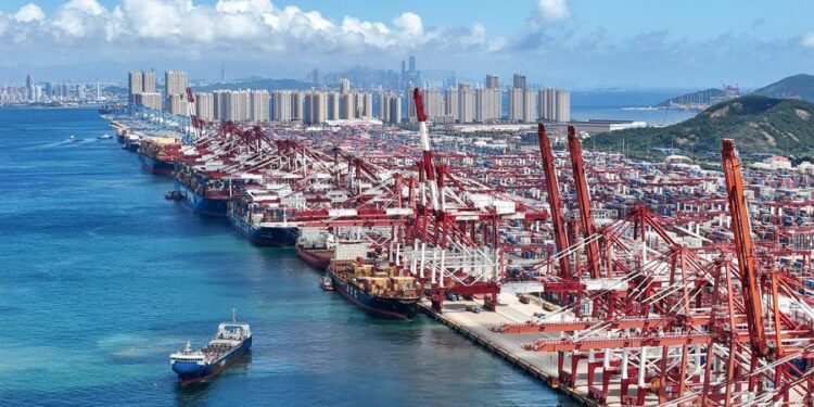 A drone photo taken on Aug. 25, 2026 shows container ships berthed at the Qianwan Container Terminal of Qingdao Port in Qingdao, east China's Shandong Province. (Photo by Zhang Jingang/Xinhua)