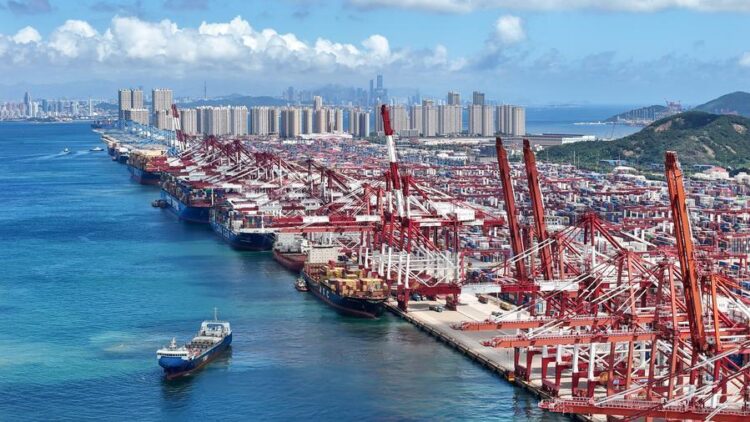 A drone photo taken on Aug. 25, 2026 shows container ships berthed at the Qianwan Container Terminal of Qingdao Port in Qingdao, east China's Shandong Province. (Photo by Zhang Jingang/Xinhua)