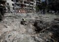 Photo taken on July 2, 2026 shows the site of a missile strike in Kiev, Ukraine. (Photo by Peter Druk/Xinhua)