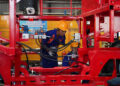 A worker assembles agricultural machinery at Heilongjiang Dewo Technology Development Co., Ltd. in Harbin, Heilongjiang Province, China, September 1, 2026. /VCG