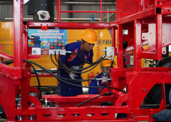 A worker assembles agricultural machinery at Heilongjiang Dewo Technology Development Co., Ltd. in Harbin, Heilongjiang Province, China, September 1, 2026. /VCG