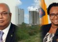 L-R Minister Juan Edgehill and Frm Minister Annette Ferguson (background- incomplete Govt offices complex)