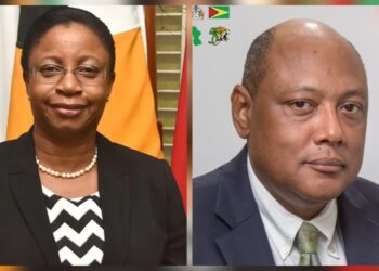 L-R Ag Chancellor Roxane George- Wiltshire and Fmr Minisrer Raphael Trotman
