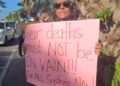 MV Barima protest sign demanding accountability