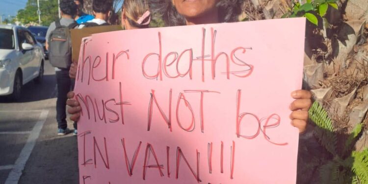 MV Barima protest sign demanding accountability