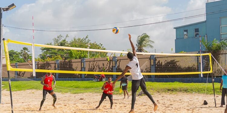 Players battle at the net during beach volleyball action, as athletes prepare for The End Game 2026, set for September 26–27 at the Marriott Beachfront in Georgetown