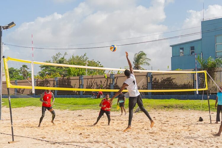 Players battle at the net during beach volleyball action, as athletes prepare for The End Game 2026, set for September 26–27 at the Marriott Beachfront in Georgetown