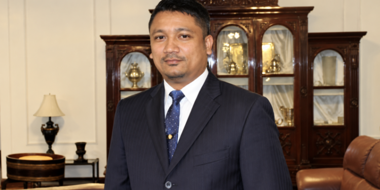 Justice Gino Pesaud