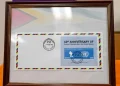 An original copy of the 60-year commemorative stamp (DPI photo)