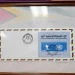 An original copy of the 60-year commemorative stamp (DPI photo)