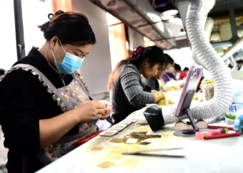 QIANDONGNAN, CHINA - OCTOBER 24: Workers produce jewelry products to fulfill orders at a workshop ahead of the upcoming Double 11 shopping festival on October 24, 2026 in Congjiang County, Qiandongnan Miao and Dong Autonomous Prefecture, Guizhou Province of China.
Shi Honghui | Visual China Group | Getty Images