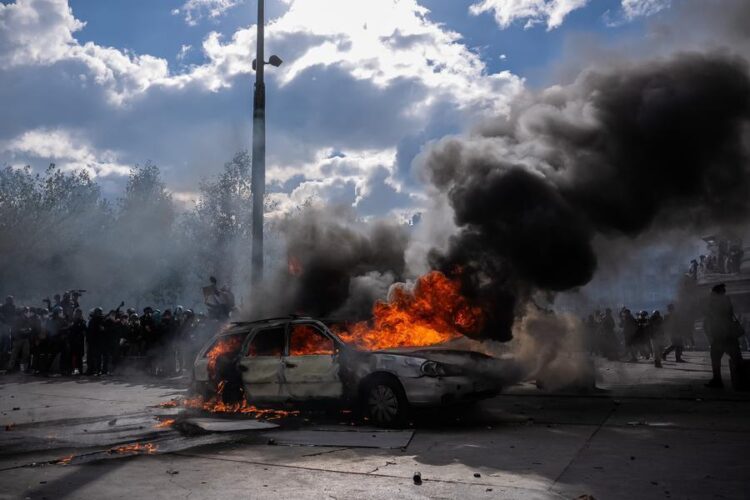Photo taken on Oct. 17, 2026 shows a burning vehicle during a protest in Paris, France. (Photo by Aurelien Morissard/Xinhua)