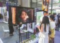 Short dramas produced by Flytoto Culture &Technology Co draw crowds of visitors at the 23rd China-ASEAN Expo. [Photo provided to CHINA DAILY]