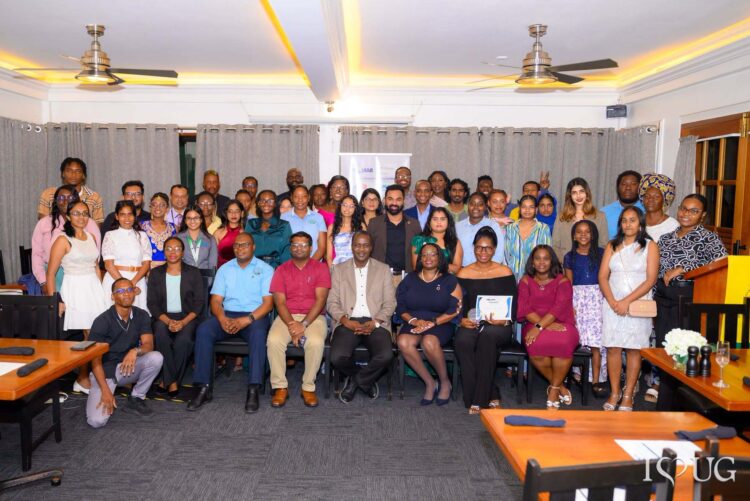 Professor Temitope Oyedotun, Guyana-PROMAR Project Lead and lecturer in the University of Guyana’s Faculty of Earth and Environmental Sciences; Mr. Amarnath Munnolimath, Head of Green and Circular Economy at adelphi; and Ms. Tracy Phillips of the United Nations Environment Programme (UNEP) Cartagena Convention Secretariat, pose with awardees and attendees at the PROMAR closing ceremony at the Grand Coastal Inn Hotel, East Coast Demerara, on October 14, 2026, marking the conclusion of the project’s implementation phase in Guyana.