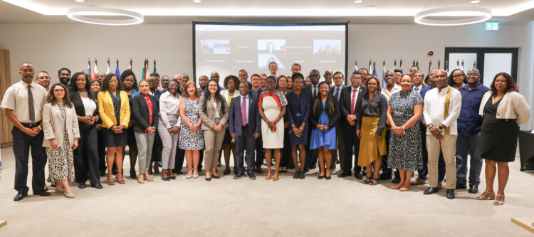 fLASHBACK | Anguilla's Chief Statistician, Ms. Lori-Rae Alleyne-Franklin (centre) with other delegates at the 50th Meeting of the SCCS in Curacao last year
