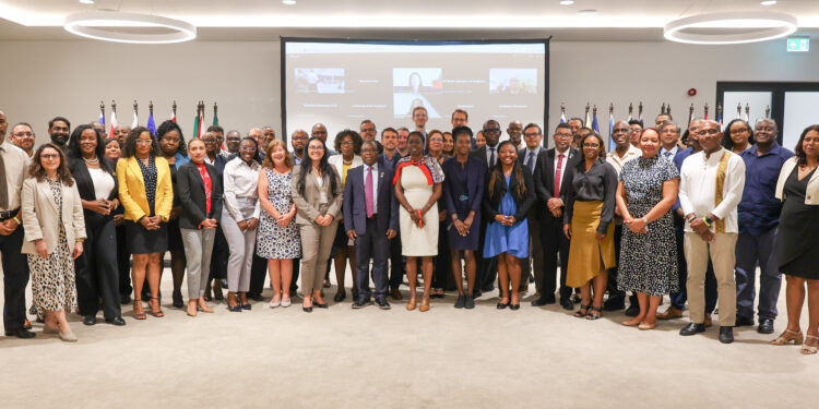 fLASHBACK | Anguilla's Chief Statistician, Ms. Lori-Rae Alleyne-Franklin (centre) with other delegates at the 50th Meeting of the SCCS in Curacao last year
