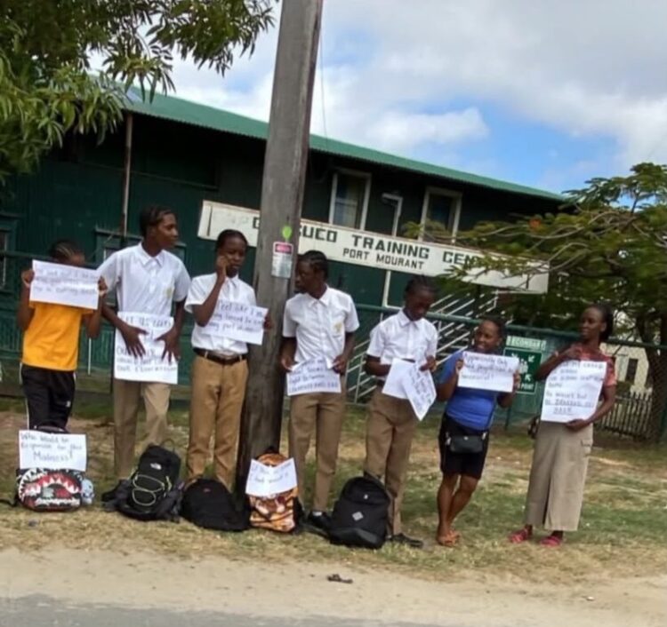 Corentyne Comprehensive High School holding placards this morning on the matter of male students. October 2, 2026