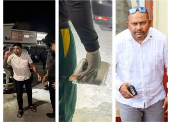 L-R Opposition Leader Mohamed (in white shirt), the alleged gun found, and Special Branch head Prem Narine
