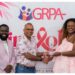 GGI Lead, Alicia Bess-Anderson accepting the award from the Honourable Dr. Frank Anthony, Minister of Health in the presence of Executive Director of the Guyana Responsible Parenthood Association (GRPA), Kobe Smith.
