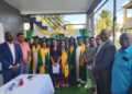 Photo caption: From left, Dr. Kofi Dalrymple and Mahaicony/Abary NDC Vice Chairman Mr. Leon Wordsworth, with the graduates and lecturer Ms. Chandradai Devina Persaud, Regional Chairman Mr. Recardo Phillips, Regional Executive Officer Ms. Mary Samaroo, Mr. Hansen Elliot, Principal of the Kuru Kuru Cooperative College and Mr. Matthews representative of Kuru Kuru College