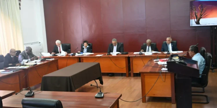 Members of the Presidential Commission of Inquiry (COI) into the MV Barima during the seventh day of public hearings at the Arthur Chung Conference Centre (ACCC)