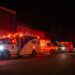 Emergency crews and military personnel gather at the Wainwright Health Centre as injured military members are treated after a fire at Canadian Forces Base Wainwright, outside of Wainwright, Alberta Saturday, Oct. 17, 2026. (John Ulan/The Canadian Press via AP)