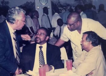 Robert Corbin (centre) Derrick Cummings to his left