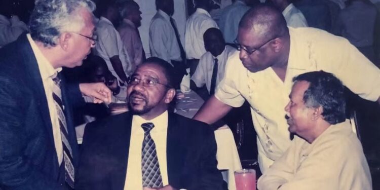Robert Corbin (centre) Derrick Cummings to his left