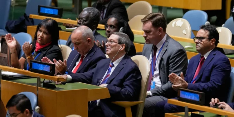 The Cuban delegation, including Cuban foreign minister Bruno Rodriguez Parrilla, center, reacts after a vote on ending the United States’ blockade of Cuba at United Nations headquarters, Wednesday, Oct. 28, 2026. (AP Photo/Seth Wenig) License this photo