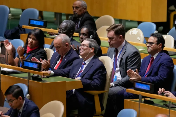 The Cuban delegation, including Cuban foreign minister Bruno Rodriguez Parrilla, center, reacts after a vote on ending the United States’ blockade of Cuba at United Nations headquarters, Wednesday, Oct. 28, 2026. (AP Photo/Seth Wenig) License this photo