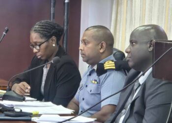 Center- Guyana Defence Force Coast Guard Commander David Shamsudeen