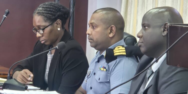 Center- Guyana Defence Force Coast Guard Commander David Shamsudeen