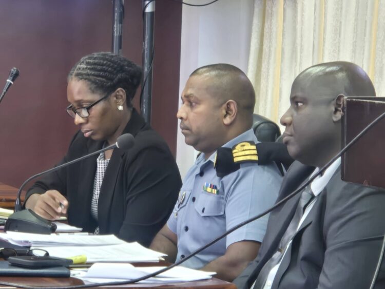 Center- Guyana Defence Force Coast Guard Commander David Shamsudeen