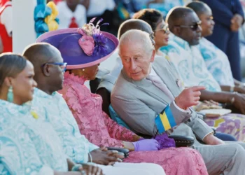Britain’s King Charles III chats with Governor General of The Bahamas Cynthia Pratt at The Future Bahamas Youth Rally and Exhibition at Clifford Park in Nassau, Bahamas, Tuesday, Oct. 27, 2026. (AP Photo/Tim Aylen) License this photo