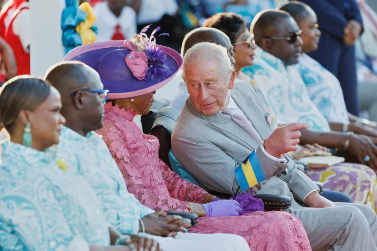 Britain’s King Charles III chats with Governor General of The Bahamas Cynthia Pratt at The Future Bahamas Youth Rally and Exhibition at Clifford Park in Nassau, Bahamas, Tuesday, Oct. 27, 2026. (AP Photo/Tim Aylen) License this photo
