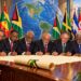 Illustration of former heads of government of the Caribbean Community signing a petition to Heads of Government of the United Nations in. support of Cuba.