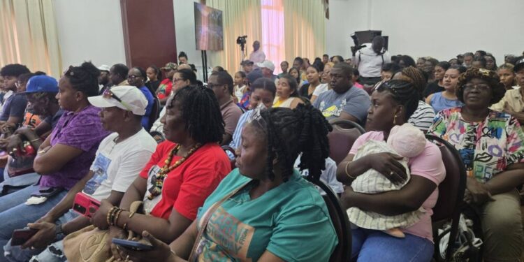 Families and supporters of the MV Barima tragedy attending the Commissioners COI meeting October 7, 2026 at Arthur Chung Convention (Kyon Brown's mother sitting in front row in red t-shirt)